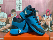 Blue and black Nike KD basketball shoes shown at an angle.