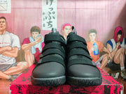 Front view of black Nike LeBron high-top shoes with multiple adjustable straps
