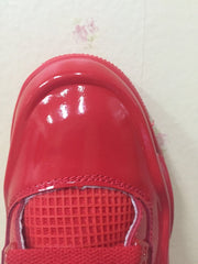 Close-up of the red toe box and mesh panel.