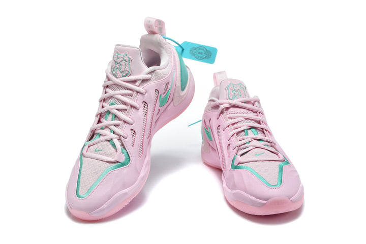 Pair of pink and mint Nike Sabrina 2 basketball shoes viewed from the front
