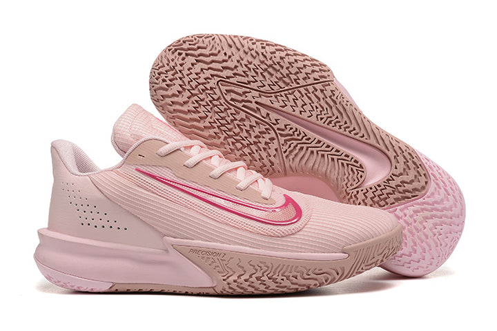 Pale pink Nike Precision 7 basketball shoes, including a view of the patterned outsole.