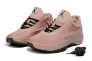 Pair of rust pink Jordan 40 shoes in a front three-quarter view with black laces.