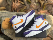 Angled overhead view of the pair showing the contrasting side panels, laces and high collars.