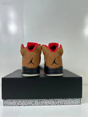 Rear view of the pair showing the heel logos, brown uppers, red collars, and black heel sections.
