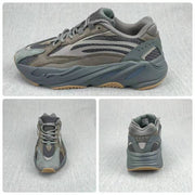 Collage showing side, front, and rear views of the gray sneaker.