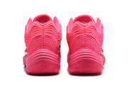 Rear view of the pink Nike basketball sneakers showing the padded collars and layered heel detailing.