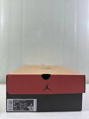 Jordan shoe box with a visible Air Jordan 12 Retro label showing sample size markings and style code CT8013-140.