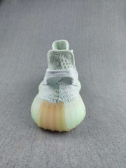 Rear view showing the heel pull tabs and translucent ribbed soles.