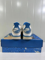 Rear view of the pair showing blue heel panels, Nike branding, and AIR lettering.