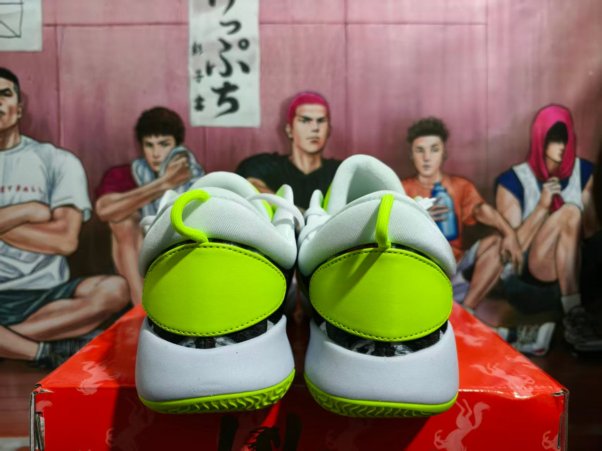 Rear view of neon green and gray Nike basketball sneakers with padded collars and textured outsole edges.