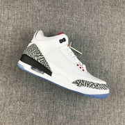 Angled view of a single white Jordan Air Jordan 3 sneaker showing the elephant-print toe and heel overlays.
