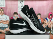 Black and white basketball shoes shown from the side, with lace-up closure and Swoosh logos