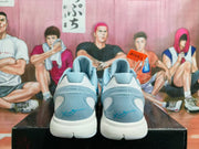Rear view of the light blue basketball shoes showing heel details