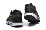 Rear views of black Nike Air Max sneakers showing the heel details and air units.