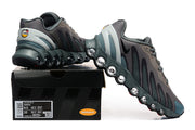 Nike Air Max DN8 sneakers in grey and teal displayed on a shoe box; the box label shows a sample size.