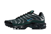 Side view of a green, silver, and black patterned Nike Air Max Plus sneaker with a blue Swoosh.