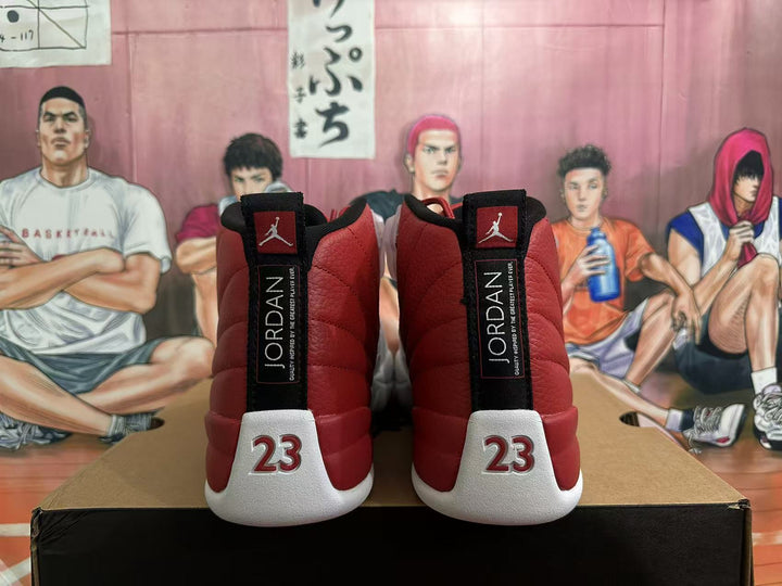Rear view of red and white Jordan high-top sneakers showing Jumpman and 23 details.