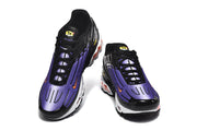 Front view of a pair of black and purple Nike Air Max Plus III sneakers.
