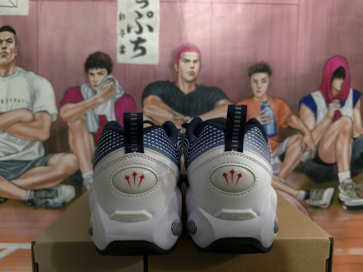 Rear view of white, blue, and gray Nike sneakers showing dark collars, heel pull tabs, red heel emblems, and black outsole edges.