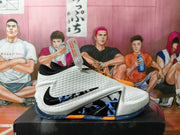 Side view of a white Nike basketball shoe with black Swoosh and graphic midsole details.