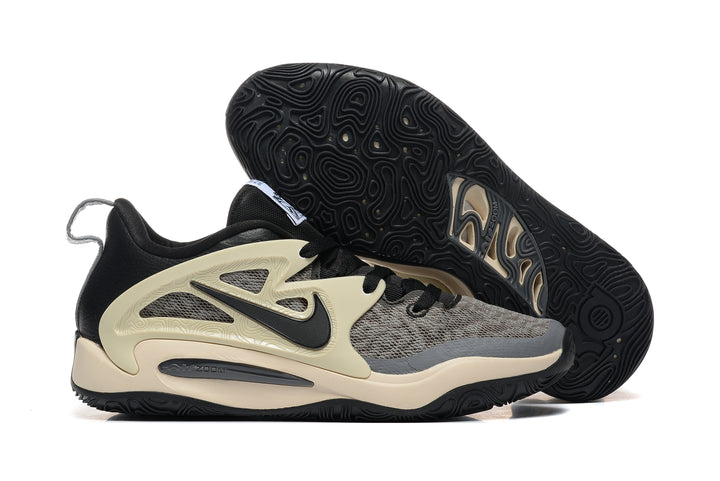 Black and gray Nike KD 15 basketball shoes with a patterned black outsole.