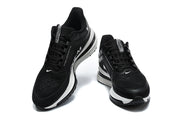 Black Nike Pegasus shoes shown from the front and above, with white midsole accents.
