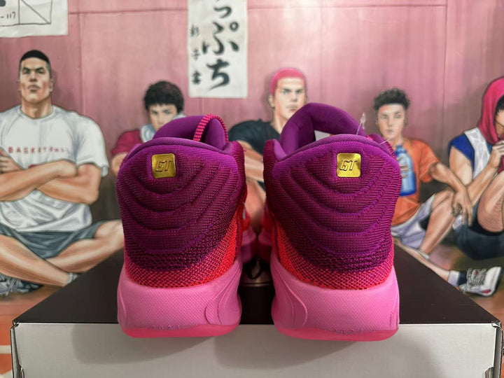 Rear view of pink and purple Nike KD 17 basketball shoes