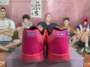 Rear view of pink basketball shoes with “12:AM” heel lettering