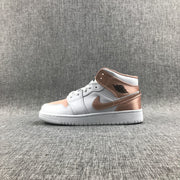 Side profile of the white and rose-gold mid-top sneaker with a white rubber sole.