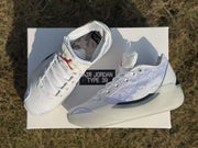 Top-down view showing the lacing, tongues, and patterned insoles