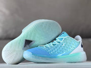 Nike Kobe 3 sneakers shown from the side and outsole, highlighting the translucent tread pattern.