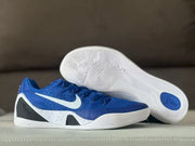 Outsole view showing the white traction pattern with blue circular details beside the royal blue upper.