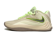 Side profile of a cream and lime Nike Giannis Immortality 7 basketball shoe