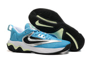 Blue, silver, and black basketball shoe with a black outsole