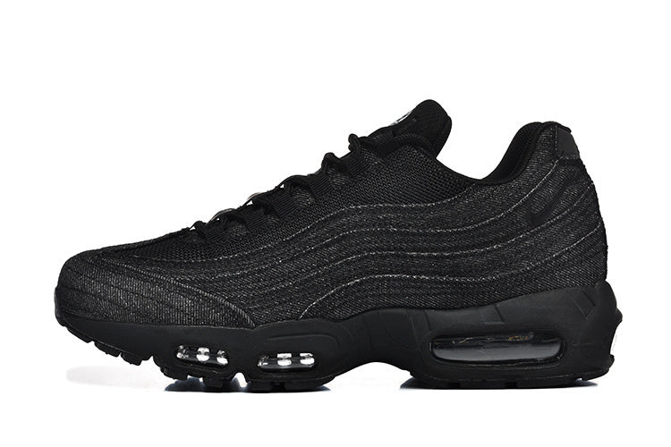 Black low-top sneaker with layered wavy side panels and visible sole cushioning windows