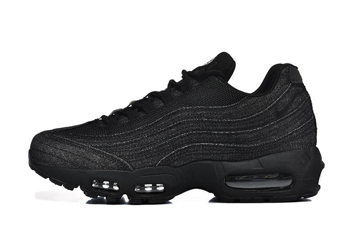 Black low-top sneaker with layered wavy side panels and visible sole cushioning windows