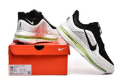 Nike Pegasus Premium shoes in black, white, and green displayed with an orange box; the box label shows US sizes 8 and 9.5.