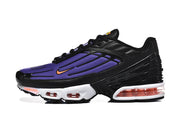 Side view of a black and purple Nike Air Max Plus III sneaker with orange accents and a white midsole.