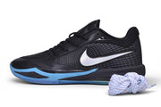 Side profile of a black Nike Sabrina 4 shoe with blue trim