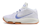 Side profile of white and blue Nike GT Hustle 3 basketball shoe.