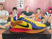 Side view of the yellow, blue, red, and orange Nike basketball shoe with a contrasting Swoosh and patterned side panels.