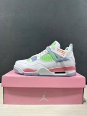 Side profile of the white and pink Air Jordan 4 Retro sneaker with lime green mesh and a visible heel air window.
