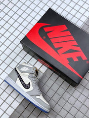 Sneaker displayed beside a Nike shoebox, showing the gray, white, and blue color scheme.
