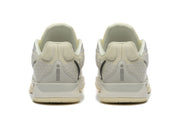 Rear view of pale yellow and light gray Nike Kobe 5 Protro shoes