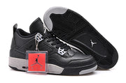 Sneaker pair with one shoe turned over to show the black patterned outsole and grey toe traction.