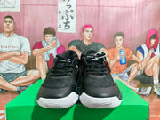 Front view showing the black lace-up uppers and white outsole accents.