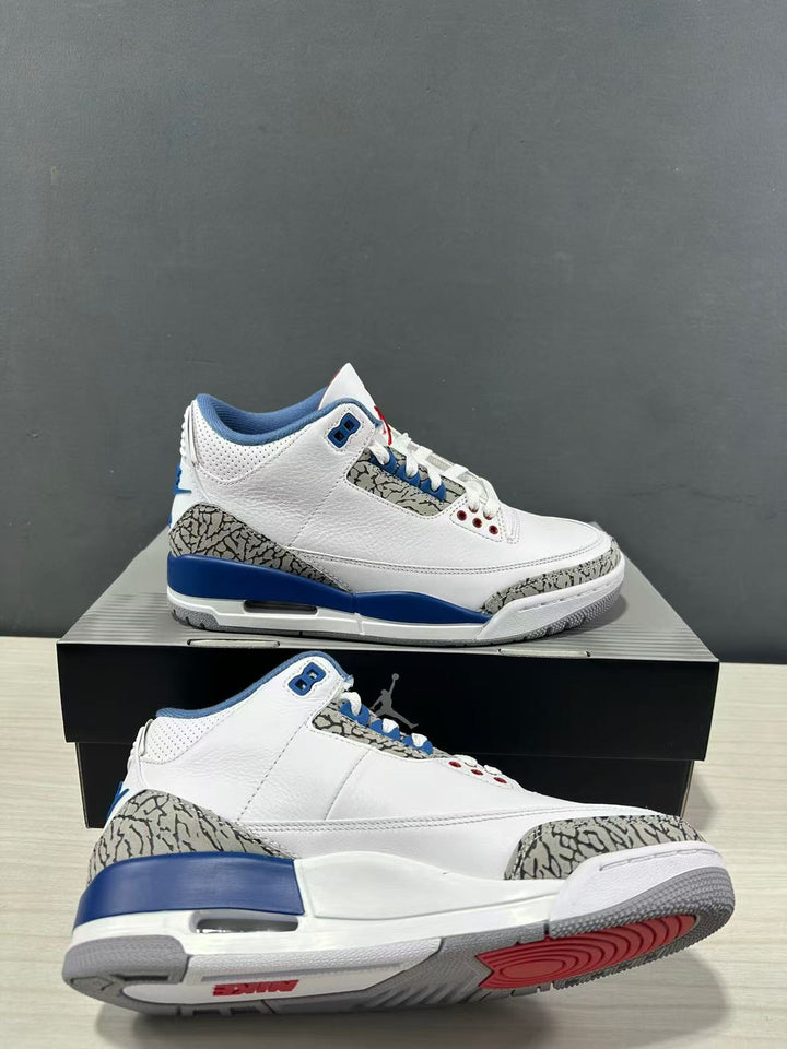 Pair of white, blue, and grey Jordan Air Jordan 3 sneakers shown from side and outsole angles on a shoebox.