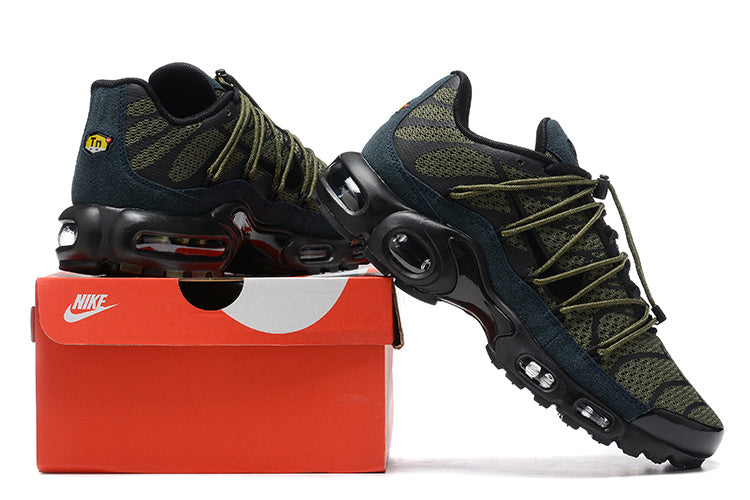 Nike TN sneakers in olive, black, and dark teal displayed with a Nike shoe box