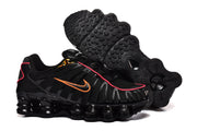 Black Nike Shox TL sneakers showing the patterned outsole and sculpted sole