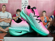 Angled view of the gradient basketball shoes showing black laces and side Swoosh